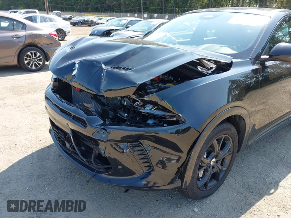 2024 Dodge Hornet R/T Plus with VIN ZACPDFDWXR3A22378, listed as a IAAI auction lot 42408784 with 5,472 mi miles and . Bid and sale history available at DreamBid. Image 6.