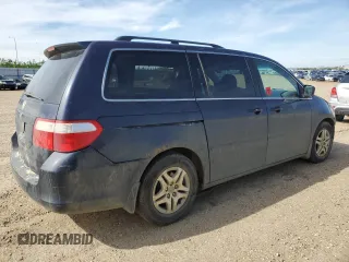 2006 Honda Odyssey EX-L z VIN 5FNRL38706B128265, wystawiony jako Copart lot #58715415 z przebiegiem 377 656 mil mil oraz Szkoda całkowita • Salvage title. Historia ofert i sprzedaży dostępna na DreamBid. Obrazek 3.