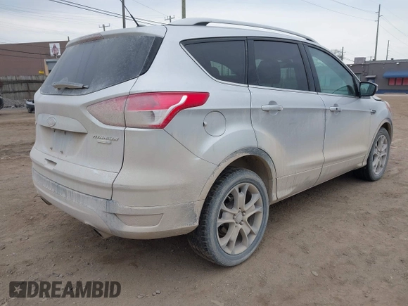 2015 Ford Escape Titanium with VIN 1FMCU9J92FUA60166, listed as a IAAI auction lot 41914080 with 103,122 mi miles and . Bid and sale history available at DreamBid. Image 4.