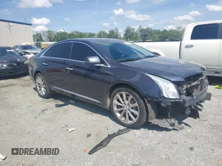 2014 Cadillac XTS Luxury with VIN 2G61M5S36E9248959, listed as a Copart auction lot 53971125 with 129,327 mi miles and Salvage title. Bid and sale history available at DreamBid. Image 4.