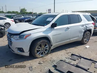 2020 Chevrolet Traverse High Country with VIN 1GNEVNKWXLJ135322, listed as a IAAI auction lot 42042466 with 105,748 mi miles and . Bid and sale history available at DreamBid. Image 2.