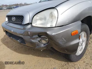 2004 Hyundai Santa Fe GLS with VIN KM8SC13D74U700404, listed as a IAAI auction lot 41735889 with 208,946 mi miles. Bid and sale history available at carsss.com. Image 6.