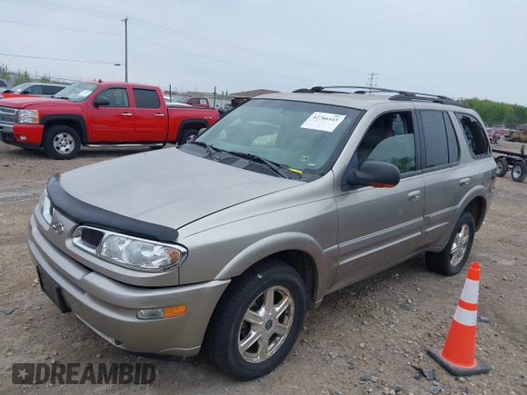 2002 Oldsmobile Bravada z VIN 1GHDT13S822363028, wystawiony jako IAAI lot #42286443 z przebiegiem 185 065 mil mil oraz . Historia ofert i sprzedaży dostępna na DreamBid. Obrazek 2.