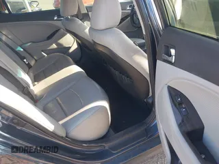 2015 Kia Optima EX with VIN 5XXGN4A77FG368704, listed as a IAAI auction lot 42174674 with 128,963 mi miles. Bid and sale history available at carsss.com. Image 8.