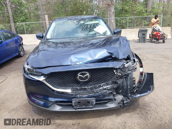 2018 Mazda CX-5 Grand Touring with VIN JM3KFBDM3J0377866, listed as a IAAI auction lot 41947014 with 70,446 mi miles. Bid and sale history available at carsss.com. Image 12.