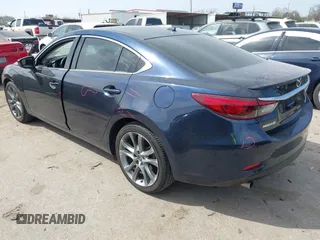 2016 Mazda 6 i Grand Touring with VIN JM1GJ1W59G1439075, listed as a IAAI auction lot 41792755 with 99,215 mi miles and . Bid and sale history available at DreamBid. Image 3.