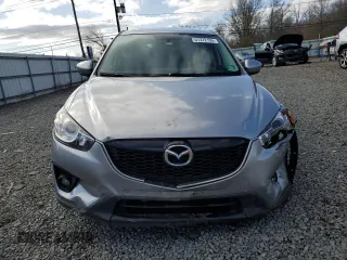 2014 Mazda CX-5 Touring with VIN JM3KE4CY4E0427294, listed as a Copart auction lot 51372155 with 121,324 mi miles and Salvage Title. Bid and sale history available at carsss.com. Image 5.