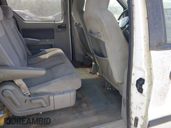 2006 Ford Freestar SE z VIN 2FMZA51626BA54942, wystawiony jako IAAI lot #42133277 z przebiegiem 119 296 mil mil oraz . Historia ofert i sprzedaży dostępna na DreamBid. Obrazek 8.