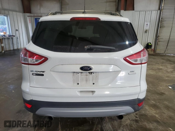 2013 Ford Escape SE z VIN 1FMCU9G93DUA69673, wystawiony jako Copart lot #61017055 z przebiegiem 204 095 mil mil oraz Czysty tytuł • Clean title. Historia ofert i sprzedaży dostępna na DreamBid. Obrazek 6.
