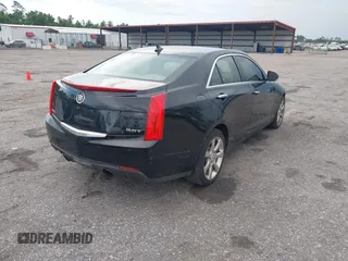 2014 Cadillac ATS Luxury AWD with VIN 1G6AH5RX5E0105296, listed as a IAAI auction lot 42534349 with 219,887 mi miles and . Bid and sale history available at DreamBid. Image 4.