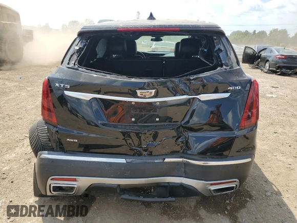 2020 Cadillac XT5 Premium Luxury AWD z VIN 1GYKNDRS4LZ142738, wystawiony jako Copart lot #61247675 z przebiegiem 60 353 mil mil oraz Szkoda całkowita • Salvage title. Historia ofert i sprzedaży dostępna na DreamBid. Obrazek 6.