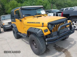 2001 Jeep Wrangler Sport z VIN 1J4FA49S21P347965, wystawiony jako IAAI lot #42290194 z przebiegiem 116 417 mil mil oraz . Historia ofert i sprzedaży dostępna na DreamBid. Obrazek 1.