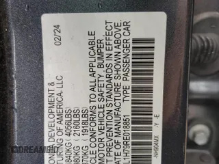 2024 Honda Civic EX-L z VIN 19XFL1H79RE018851, wystawiony jako Copart lot #54382485 z przebiegiem Nie podano mil oraz Szkoda całkowita • Salvage title. Historia ofert i sprzedaży dostępna na DreamBid. Obrazek 12.