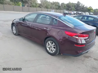 2019 Kia Optima LX with VIN 5XXGT4L36KG284965, listed as a IAAI auction lot 40374239 with 64,351 mi miles. Bid and sale history available at carsss.com. Image 3.