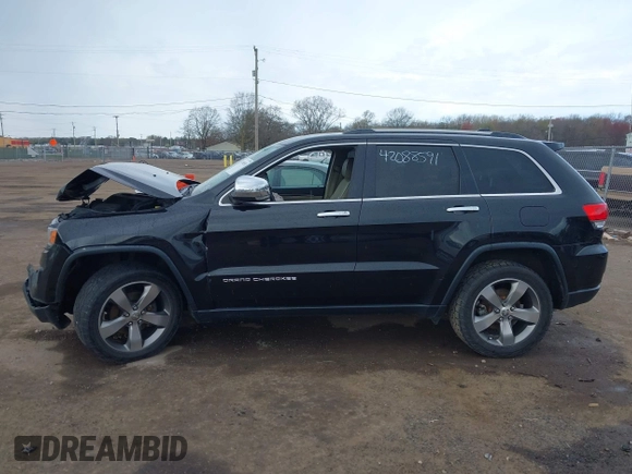 2014 Jeep Grand Cherokee Limited z VIN 1C4RJFBG9EC181218, wystawiony jako IAAI lot #42088591 z przebiegiem 159 909 mil mil oraz . Historia ofert i sprzedaży dostępna na DreamBid. Obrazek 13.