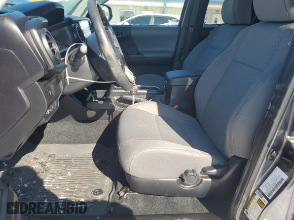 2022 Toyota Tacoma SR with VIN 3TYRZ5CN2NT020227, listed as a Copart auction lot 46265055 with 23,878 mi miles and Salvage title. Bid and sale history available at DreamBid. Image 7.