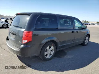 2014 Dodge Grand Caravan SE with VIN 2C4RDGBG2ER341797, listed as a Copart auction lot 49439405 with 102,633 mi miles and Salvage Title. Bid and sale history available at DreamBid. Image 3.