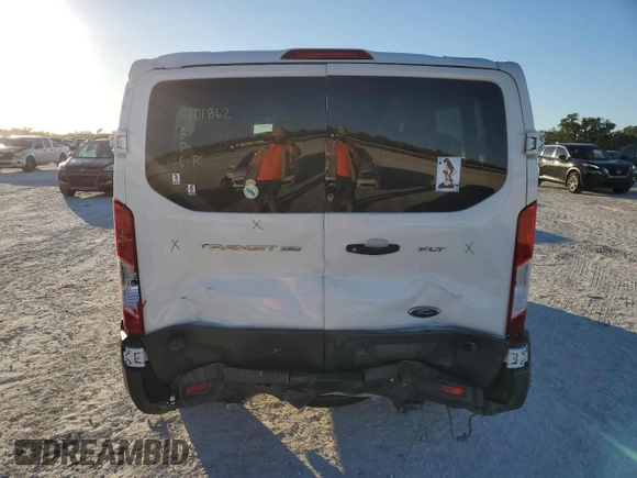 2018 Ford Transit Passenger XL z VIN 1FBZX2YM5JKA75213, wystawiony jako Copart lot #82145134 z przebiegiem 237 825 mil mil oraz Nie do naprawy • Non repairable. Historia ofert i sprzedaży dostępna na DreamBid. Obrazek 6.