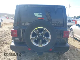 2021 Jeep Wrangler Unlimited Sahara with VIN 1C4HJXEG3MW536507, listed as a IAAI auction lot 41601893 with 51,214 mi miles and . Bid and sale history available at DreamBid. Image 16.