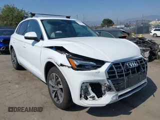 2021 Audi Q5 Premium Plus z VIN WA1BAAFY8M2109934, wystawiony jako IAAI lot #42598513 z przebiegiem 71 434 mil mil oraz . Historia ofert i sprzedaży dostępna na DreamBid. Obrazek 1.
