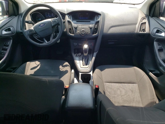 2015 Ford Focus SE with VIN 1FADP3F28FL332899, listed as a Copart auction lot 60055185 with 76,948 mi miles and Clean title. Bid and sale history available at DreamBid. Image 8.
