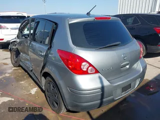 2009 Nissan Versa 1.8 SL with VIN 3N1BC13E19L372298, listed as a IAAI auction lot 42011338 with 131,882 mi miles. Bid and sale history available at carsss.com. Image 3.