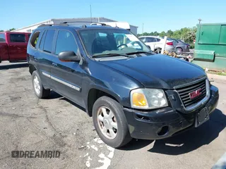 2005 GMC Envoy SLE with VIN 1GKDS13S452208252, listed as a IAAI auction lot 42357457 with 197,419 mi miles and . Bid and sale history available at DreamBid. Image 1.