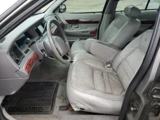 2000 Mercury Grand Marquis LS z VIN 2MEFM75WXYX742065, wystawiony jako Copart lot #57655795 z przebiegiem 175 070 mil mil oraz Tytuł czysty. Historia ofert i sprzedaży dostępna na DreamBid. Obrazek 7.