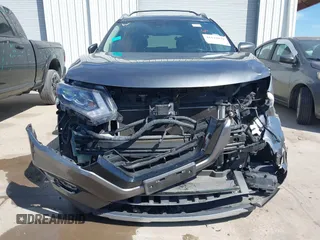 2017 Nissan Rogue SL z VIN 5N1AT2MT8HC749372, wystawiony jako IAAI lot #41622839 z przebiegiem 90 638 mil mil oraz . Historia ofert i sprzedaży dostępna na DreamBid. Obrazek 13.