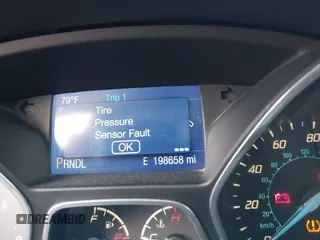 2014 Ford Focus SE with VIN 1FADP3F21EL157488, listed as a IAAI auction lot 42120325 with 198,658 mi miles and . Bid and sale history available at DreamBid. Image 7.