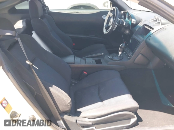 2004 Nissan 350Z Touring with VIN JN1AZ34E34T060024, listed as a IAAI auction lot 42327915 with 96,197 mi miles and . Bid and sale history available at DreamBid. Image 8.