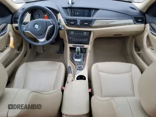 2013 BMW X1 xDrive28i z VIN WBAVL1C52DVR83974, wystawiony jako Copart lot #53567905 z przebiegiem 96 688 mil mil oraz Szkoda całkowita • Salvage title. Historia ofert i sprzedaży dostępna na DreamBid. Obrazek 8.