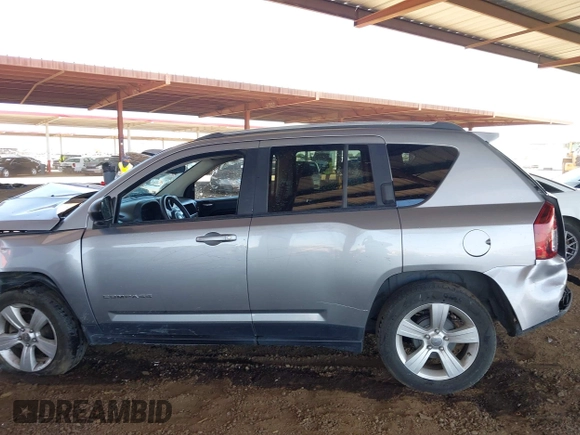 2017 Jeep Compass Sport z VIN 1C4NJCBA5HD147204, wystawiony jako IAAI lot #42552294 z przebiegiem 89 153 mil mil oraz . Historia ofert i sprzedaży dostępna na DreamBid. Obrazek 14.