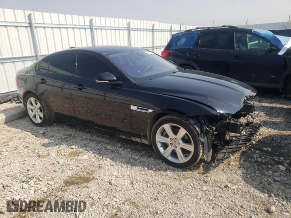 2018 Jaguar XE with VIN SAJAK4FN1JCP37010, listed as a Copart auction lot 66070803 with 84,035 mi miles and Salvage Title. Bid and sale history available at DreamBid. Image 4.