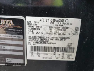 2013 Ford Utility Police Interceptor with VIN 1FM5K8AR3DGC20995, listed as a IAAI auction lot 42041125 with 199,419 mi miles. Bid and sale history available at carsss.com. Image 9.