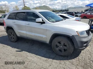 2012 Jeep Grand Cherokee Laredo with VIN 1C4RJEAG5CC182682, listed as a Copart auction lot 50644265 with 227,967 mi miles and Clean Title. Bid and sale history available at carsss.com. Image 4.