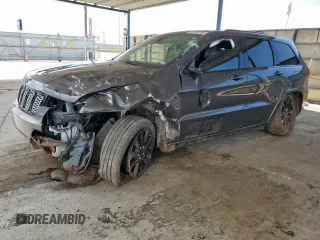 2021 Jeep Grand Cherokee Laredo E with VIN 1C4RJFAG0MC777690, listed as a Copart auction lot 62335185 with 43,976 mi miles and Salvage title. Bid and sale history available at DreamBid. Image 1.