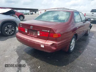 2000 Toyota Camry CE z VIN JT2BG22K3Y0521541, wystawiony jako IAAI lot #42074772 z przebiegiem 144 587 mil mil oraz . Historia ofert i sprzedaży dostępna na DreamBid. Obrazek 4.