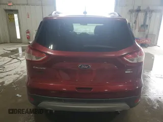 2016 Ford Escape SE with VIN 1FMCU9GXXGUB86959, listed as a Copart auction lot 54616815 with 141,086 mi miles and Clean Title. Bid and sale history available at DreamBid. Image 6.