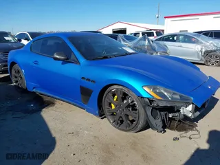 2013 Maserati GranTurismo Sport with VIN ZAM45VLA5D0070499, listed as a IAAI auction lot 41284315 with 50,156 mi miles. Bid and sale history available at carsss.com. Image 1.