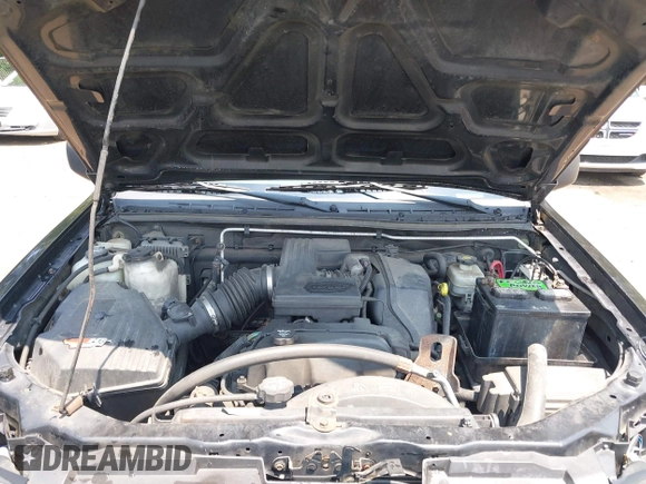 2005 Chevrolet Colorado LS Z71 z VIN 1GCDT196158100185, wystawiony jako IAAI lot #42413707 z przebiegiem 224 330 mil mil oraz . Historia ofert i sprzedaży dostępna na DreamBid. Obrazek 10.