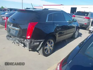 2015 Cadillac SRX Premium Collection with VIN 3GYFNGE3XFS554620, listed as a IAAI auction lot 42308670 with 95,063 mi miles and . Bid and sale history available at DreamBid. Image 4.