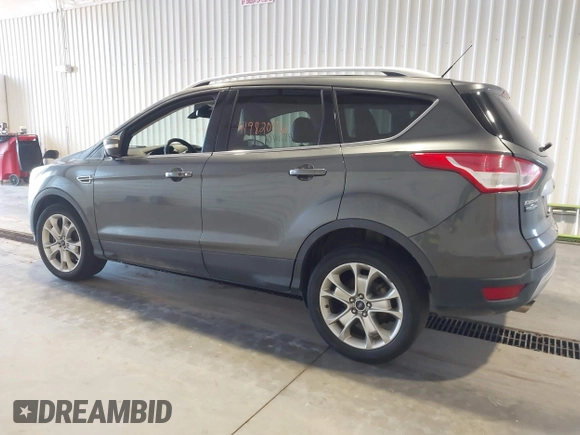 2016 Ford Escape Titanium with VIN 1FMCU9J9XGUC30596, listed as a IAAI auction lot 42024166 with 179,340 mi miles. Bid and sale history available at carsss.com. Image 14.