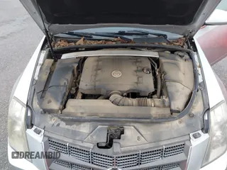 2009 Cadillac CTS AWD w/1SA with VIN 1G6DG577990155465, listed as a IAAI auction lot 41947102 with 1 mi miles. Bid and sale history available at carsss.com. Image 10.