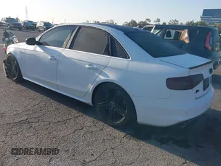 2013 Audi S4 Premium Plus with VIN WAUBGAFL3DA255394, listed as a IAAI auction lot 41965354 with 125,756 mi miles and . Bid and sale history available at DreamBid. Image 3.