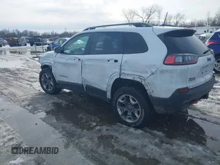 2019 Jeep Cherokee Trailhawk Elite with VIN 1C4PJMBX0KD315275, listed as a IAAI auction lot 41630464 with 94,558 mi miles. Bid and sale history available at carsss.com. Image 3.