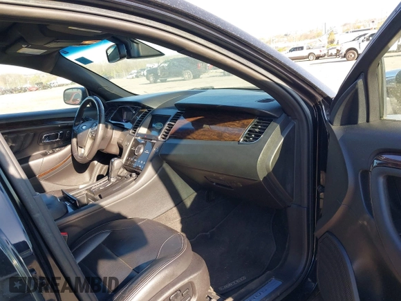 2016 Ford Taurus Limited with VIN 1FAHP2F87GG116553, listed as a IAAI auction lot 42070788 with 106,130 mi miles and . Bid and sale history available at DreamBid. Image 5.
