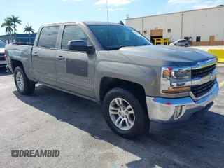 2017 Chevrolet Silverado 1500 LT with VIN 3GCPCREC1HG380406, listed as a IAAI auction lot 42031974 with 128,444 mi miles. Bid and sale history available at carsss.com. Image 1.