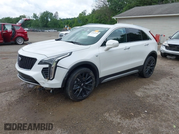 2022 Cadillac XT4 AWD Premium Luxury z VIN 1GYFZDR42NF128199, wystawiony jako IAAI lot #42522314 z przebiegiem 29 002 mil mil oraz . Historia ofert i sprzedaży dostępna na DreamBid. Obrazek 19.