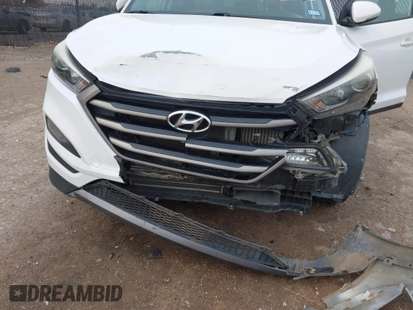 2016 Hyundai Tucson Sport with VIN KM8J33A2XGU242256, listed as a IAAI auction lot 41065573 with 97,503 mi miles. Bid and sale history available at carsss.com. Image 6.